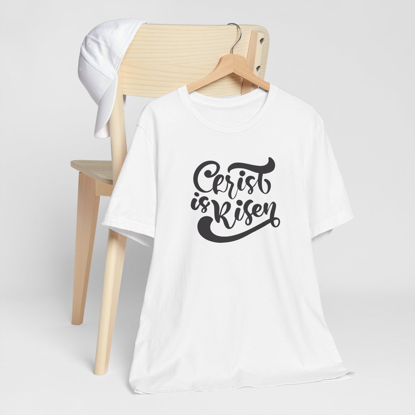 Christ is Risen Black Print Unisex Jersey Short Sleeve Tee