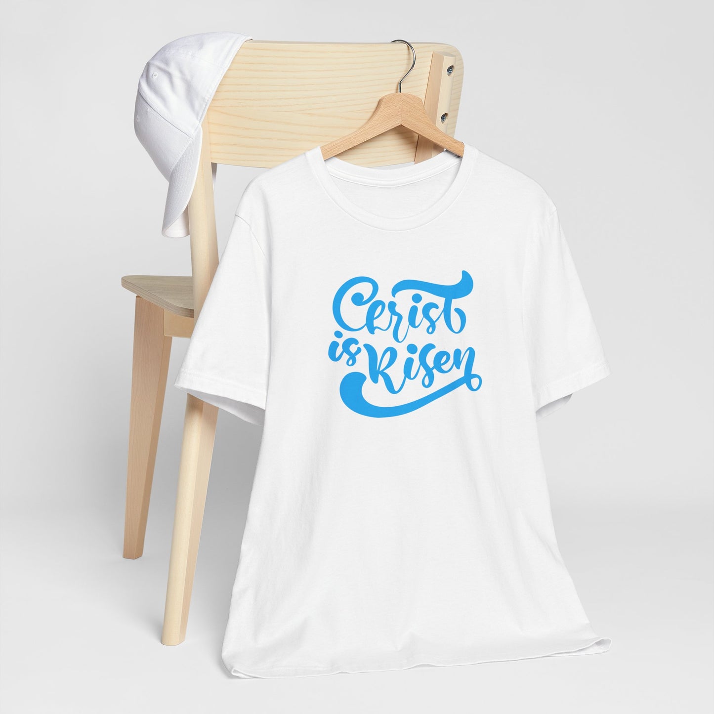 Christ is Risen Blue Print Unisex Jersey Short Sleeve Tee