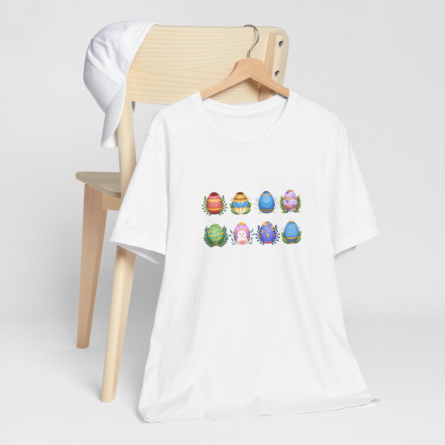 Egg-citing Wreaths Colorful Easter Egg Rows & Spring Leaves Unisex Jersey Short Sleeve Tee